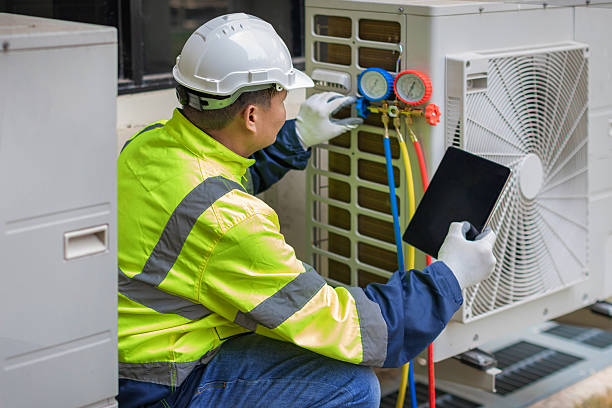 Professional Hvac technician working in Weston, MA